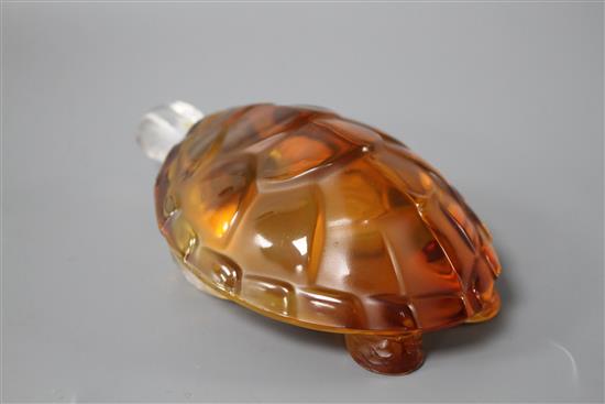 A modern Lalique amber tinted glass model of a turtle, signed with Made in France sticker, length 14.5cm